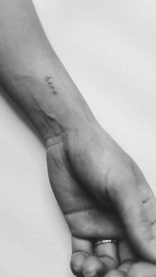 Fine Line Tattoo